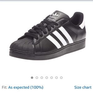 Black adidas superstars.